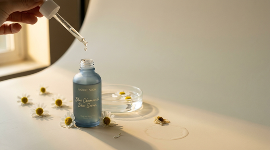 Blue Chamomile Dew Serum with chamomile blossoms